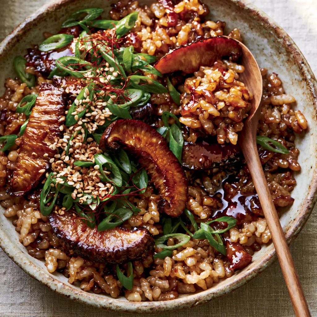 Mushrooms with Sticky Rice: The Ultimate Umami-Glazed Shiitake Bowl 1 Close-up detail showing the glossy dark soy glaze on plump grains of rice and seared mushroom edges. (mushrooms with sticky rice)