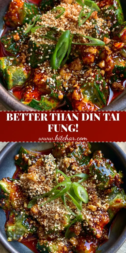 Spicy Asian Cucumber Salad with Chili Garlic Oil (Smashed) 3 A top-down view of Spicy Asian Cucumber Salad with smashed cucumbers and red chili oil in a dark matte bowl.